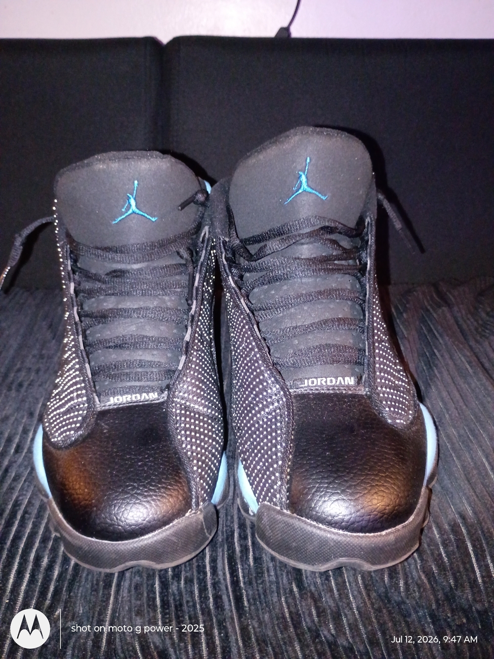 Jordan 13s Black Sneakers with Teal Jumpman Accents